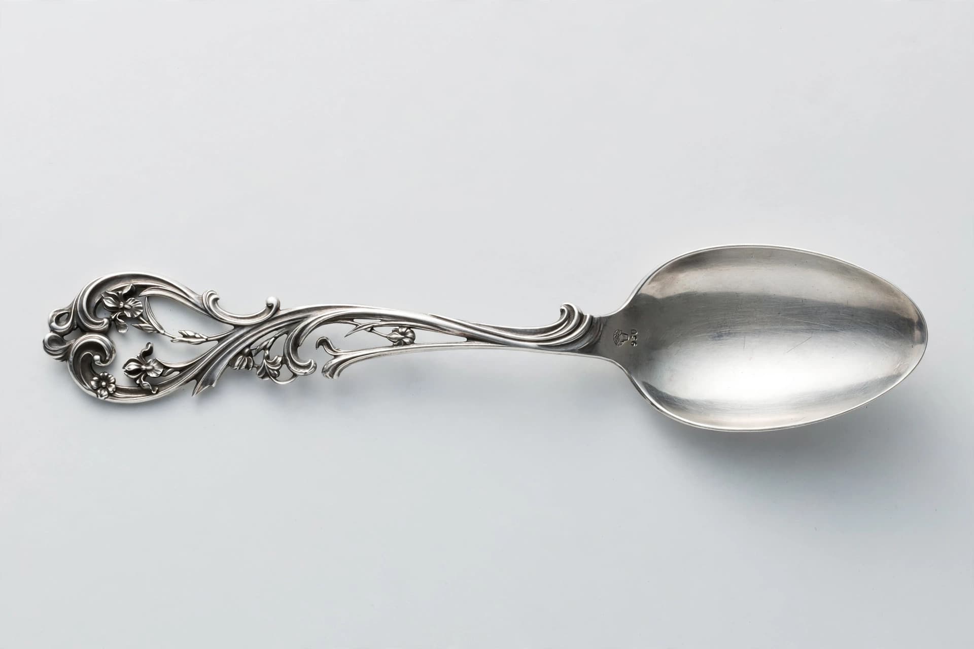 French Art Nouveau Silver Serving Spoon with Rococo Handle — Primary view