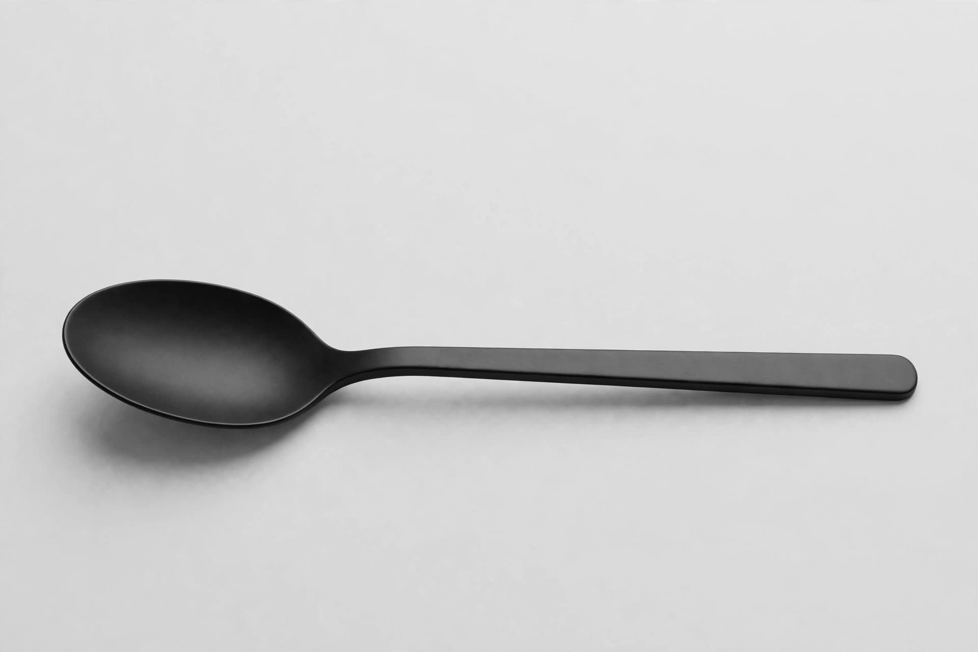 Contemporary Black Stainless Steel Teaspoon — Primary view
