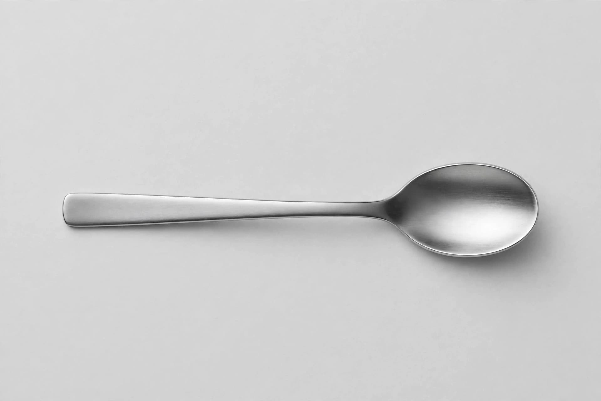 Danish Modern Stainless Steel Dessert Spoon — Primary view